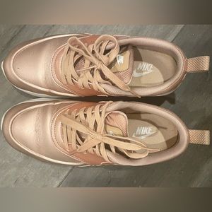 Rose gold Nike sneakers